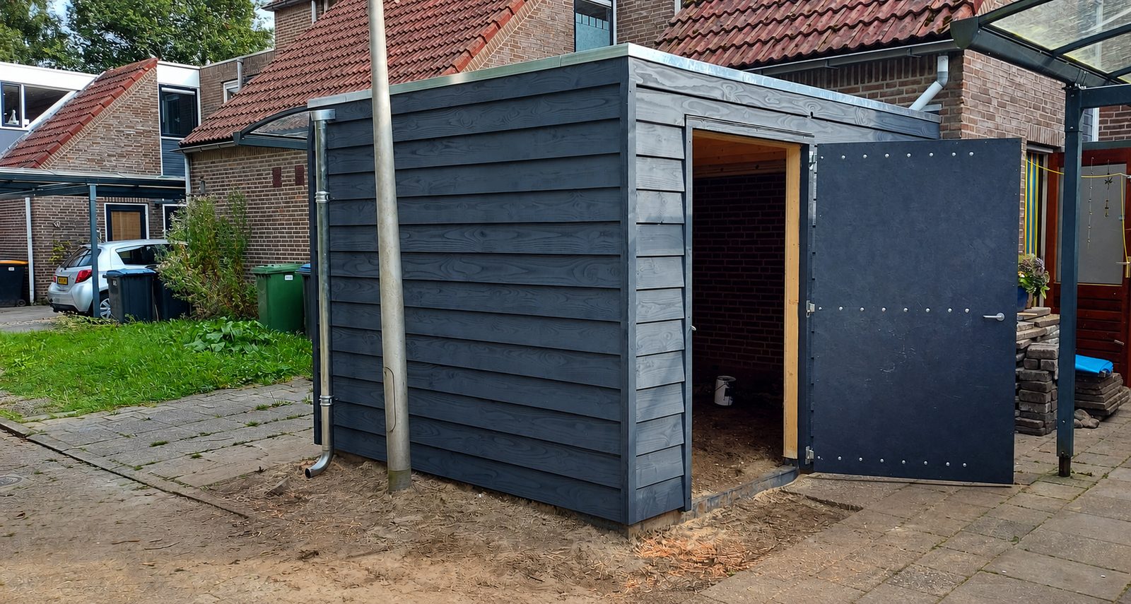 Compact houten maatwerkschuurtje in Assen